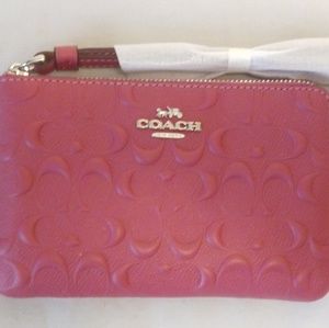 NWT Coach Pink Corner Zip Wristlet. MSRP: $98